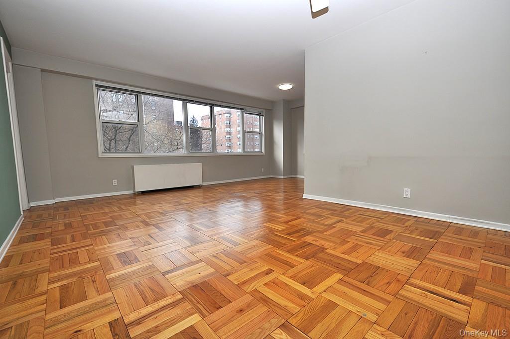 260 Garth Road, Unit 4G5 Scarsdale, NY 10583 - Photo 4 of 48 a view of an empty room with a window