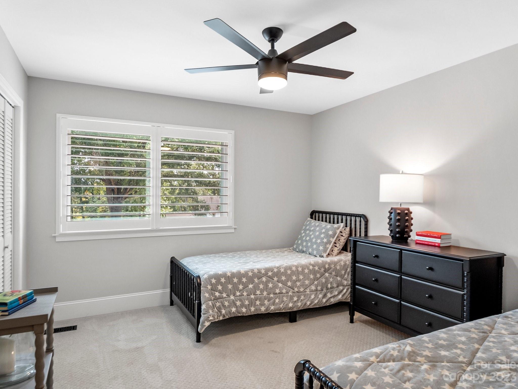 4516 Rounding Run Road Charlotte, NC 28277 - Photo 13 of 33 a bedroom with a bed dresser and a window