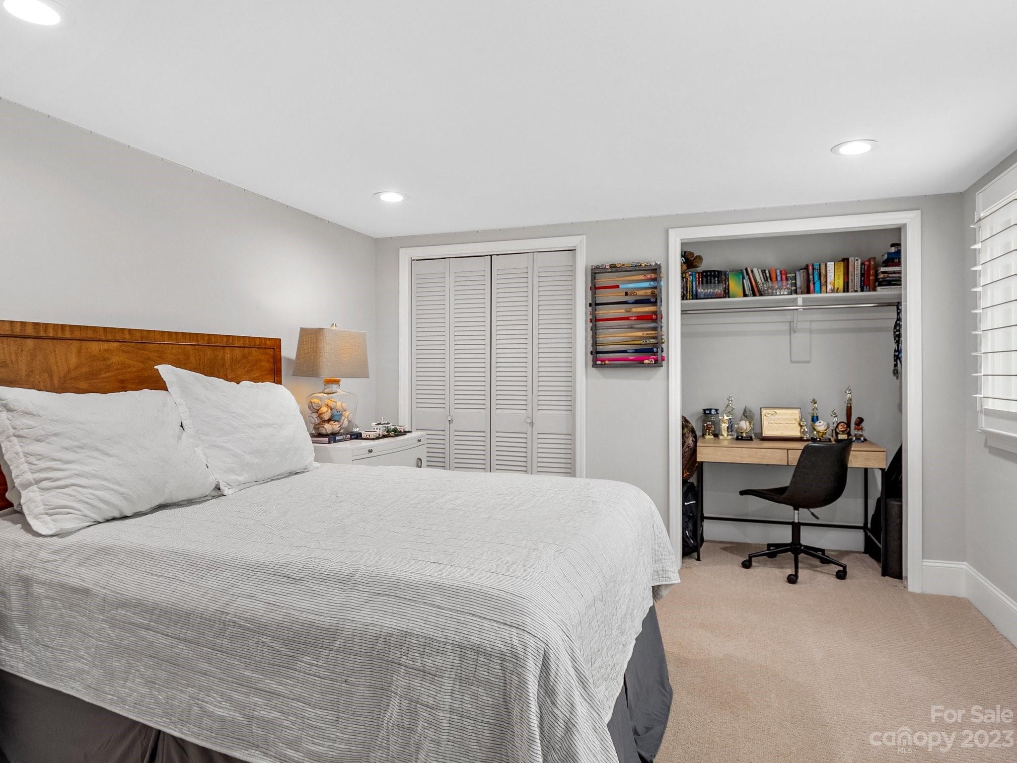 4516 Rounding Run Road Charlotte, NC 28277 - Photo 23 of 33 a bedroom with a bed and a chair