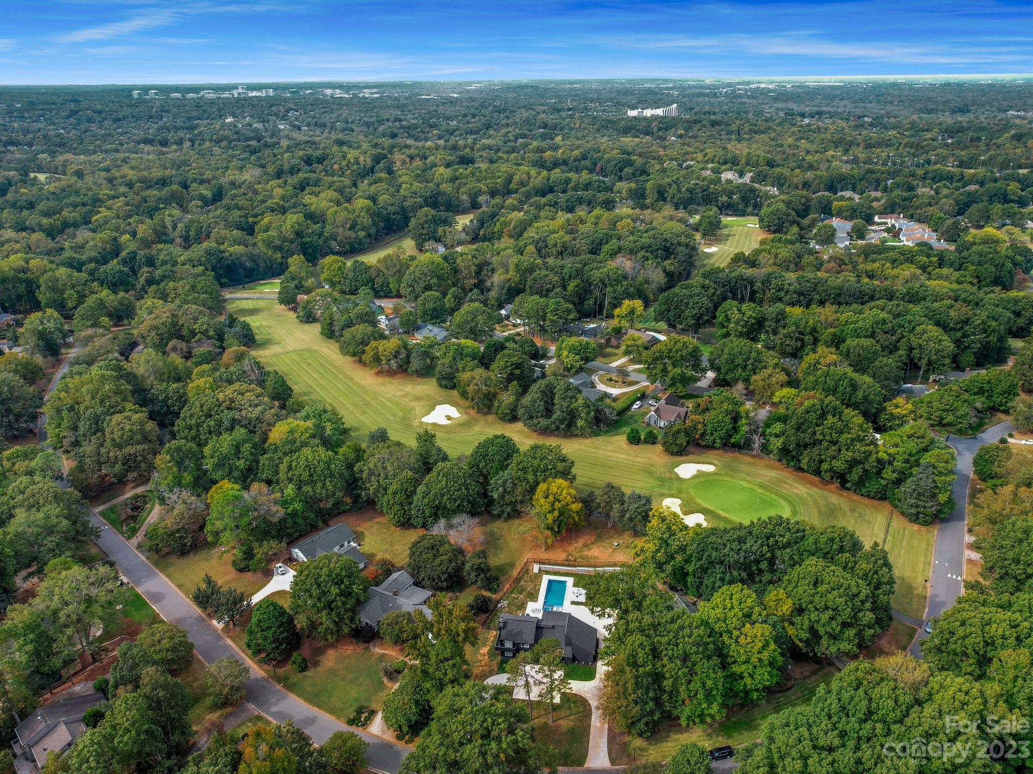 4516 Rounding Run Road Charlotte, NC 28277 - Photo 31 of 33 an aerial view of residential houses with outdoor space and trees