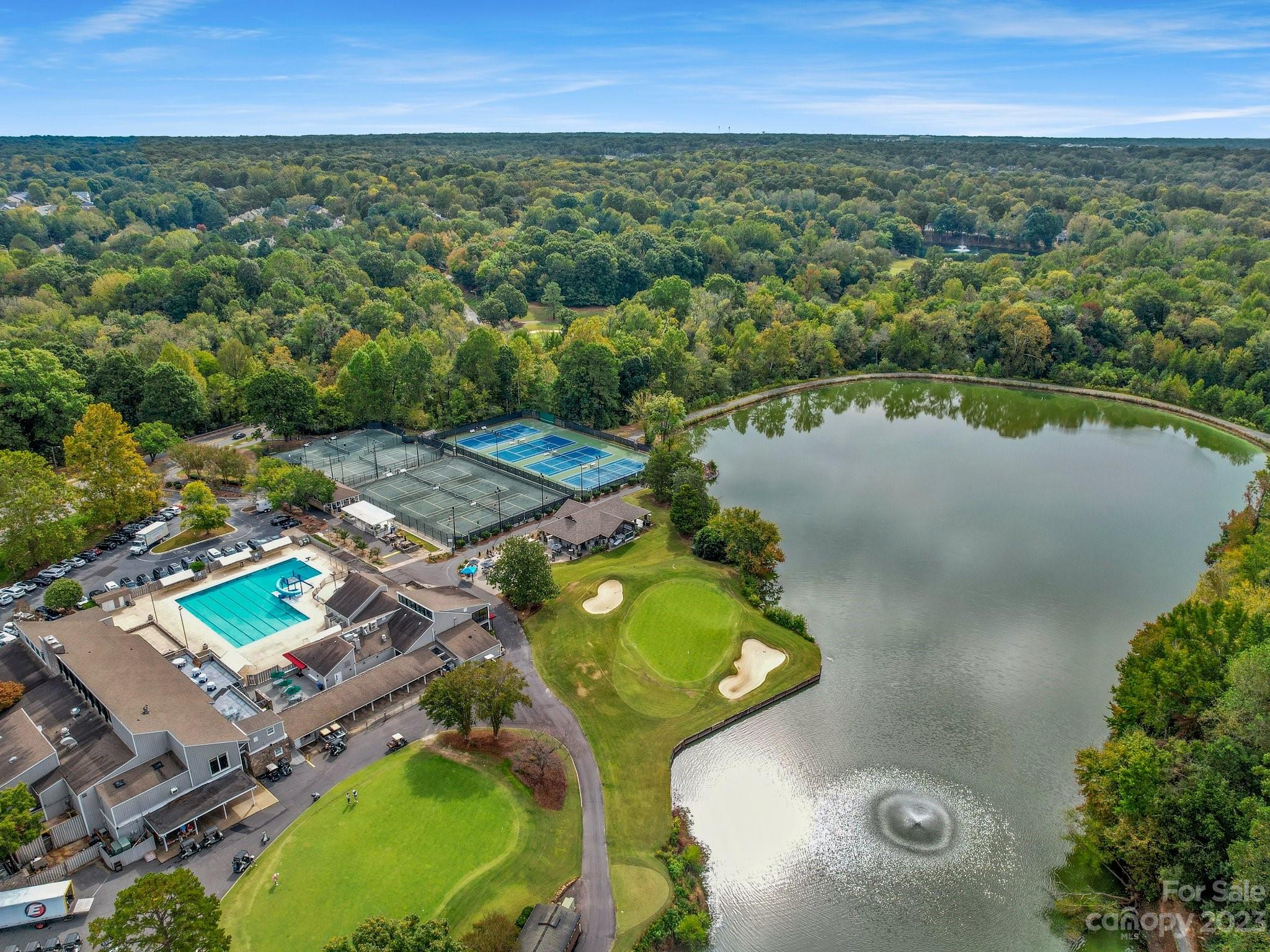 4516 Rounding Run Road Charlotte, NC 28277 - Photo 33 of 33 an aerial view of a house with a swimming pool yard and outdoor seating