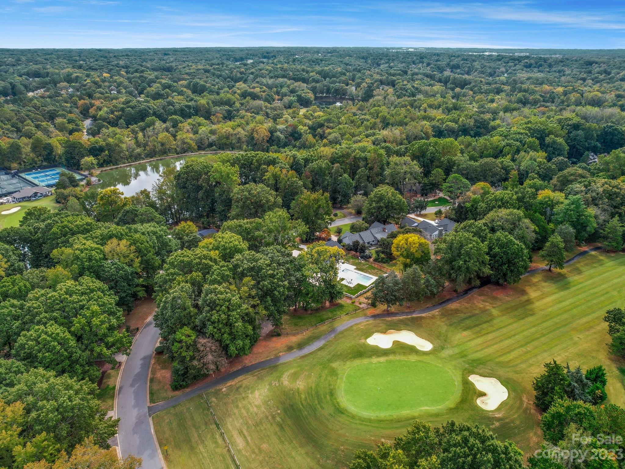 4516 Rounding Run Road Charlotte, NC 28277 - Photo 5 of 33 an aerial view of residential houses with outdoor space and trees