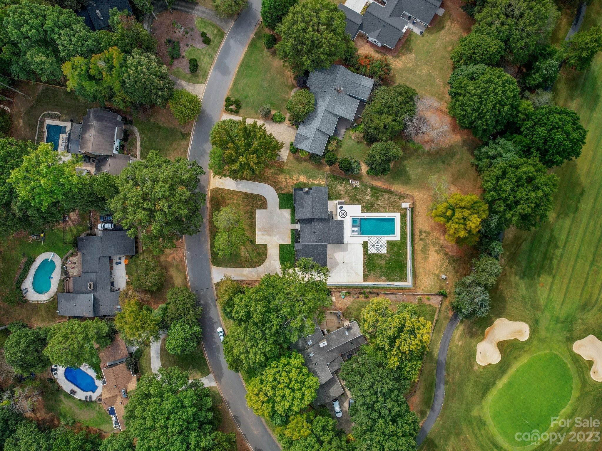 4516 Rounding Run Road Charlotte, NC 28277 - Photo 7 of 33 an aerial view of a house with a yard and lake view
