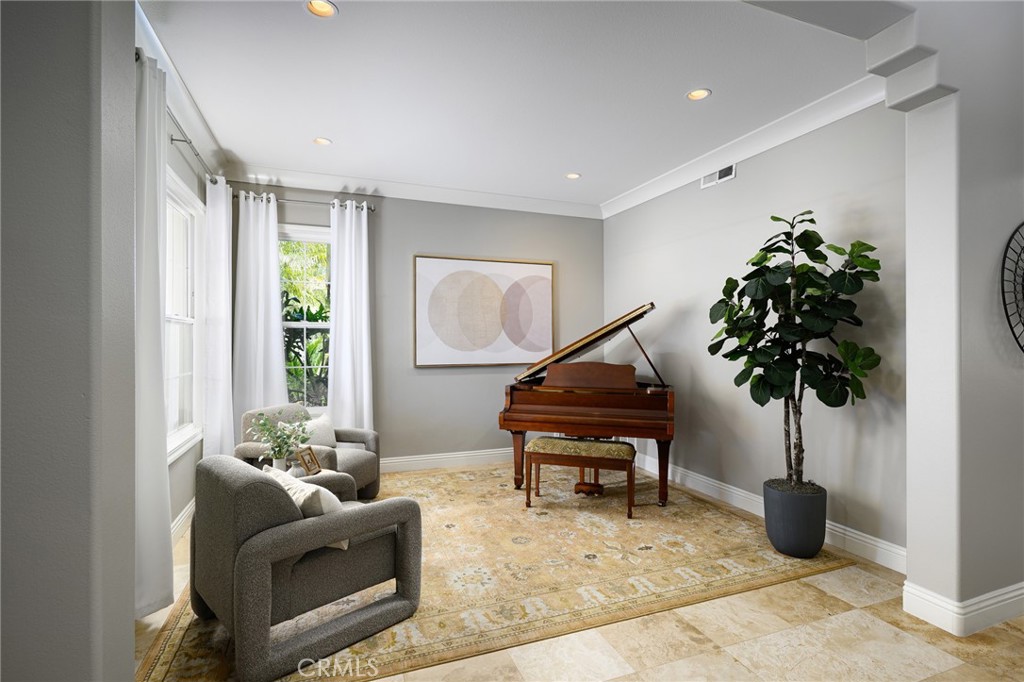 12 Serna Rancho Santa Margarita, CA 92688 - Photo 12 of 75 a living room with furniture potted plant and a window