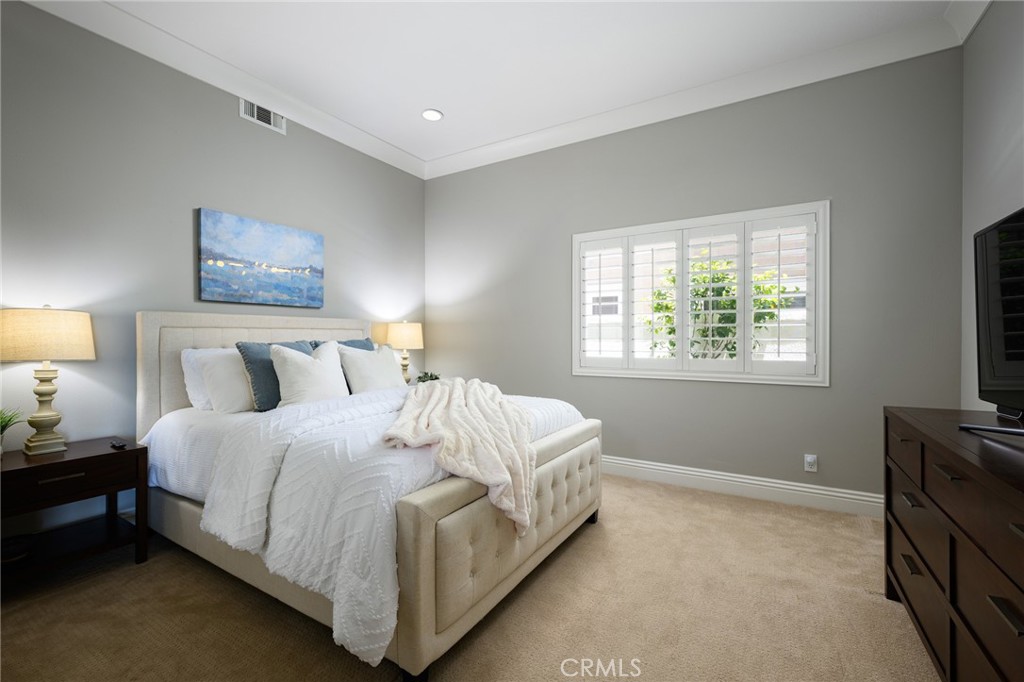 12 Serna Rancho Santa Margarita, CA 92688 - Photo 13 of 75 a bed room with a bed and a tv