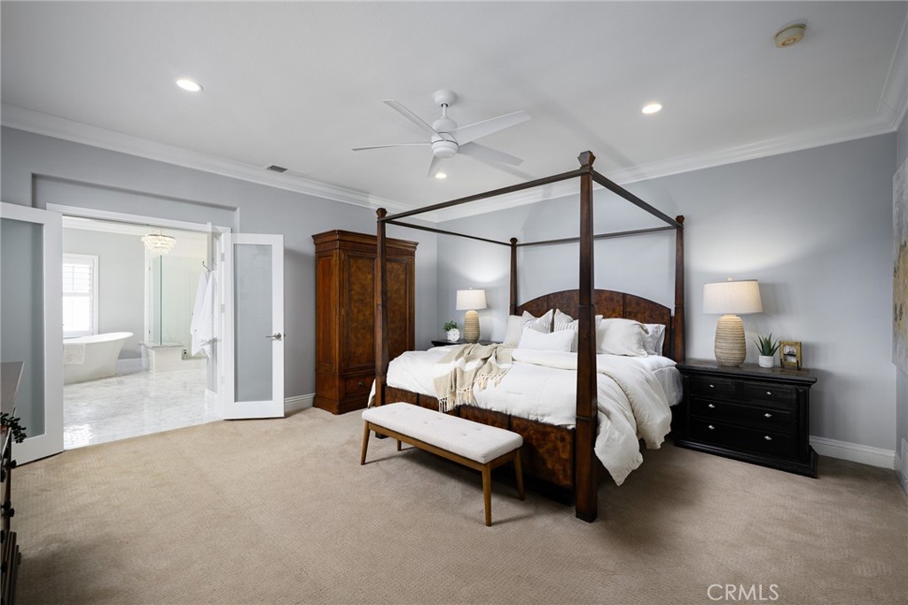 12 Serna Rancho Santa Margarita, CA 92688 - Photo 17 of 75 a spacious bedroom with a bed and a walk in closet