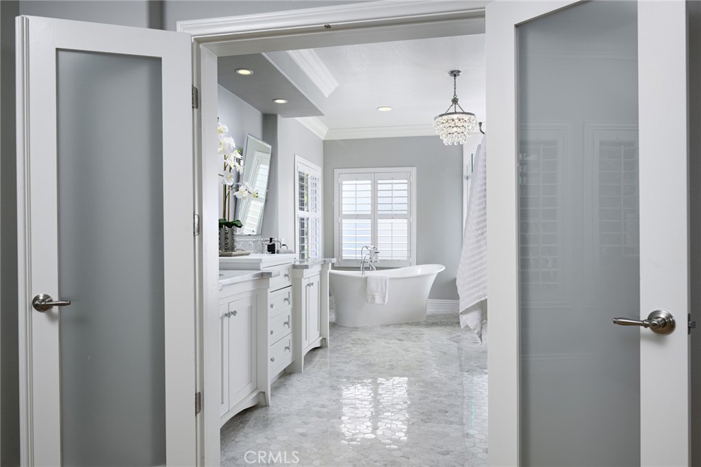12 Serna Rancho Santa Margarita, CA 92688 - Photo 18 of 75 Primary bathroom through glass double doors.