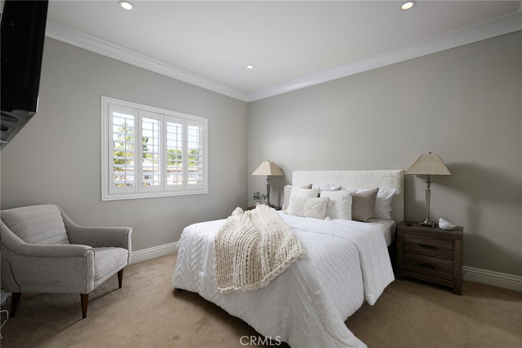 12 Serna Rancho Santa Margarita, CA 92688 - Photo 25 of 75 a bedroom with a bed and a couch