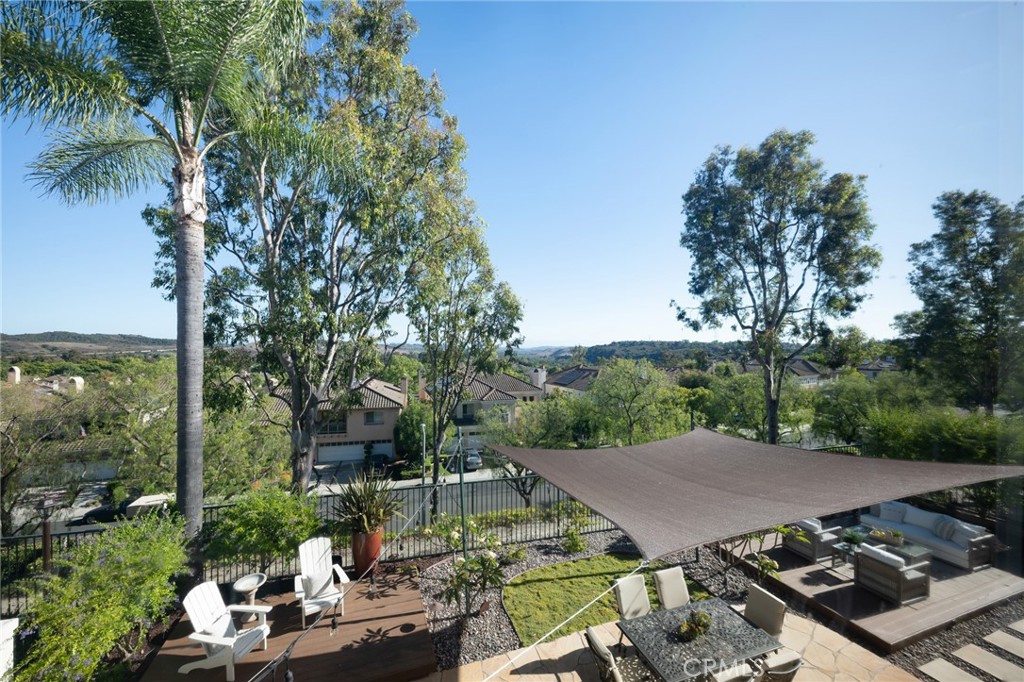 12 Serna Rancho Santa Margarita, CA 92688 - Photo 41 of 75 a view of a patio with table and chairs and potted plants