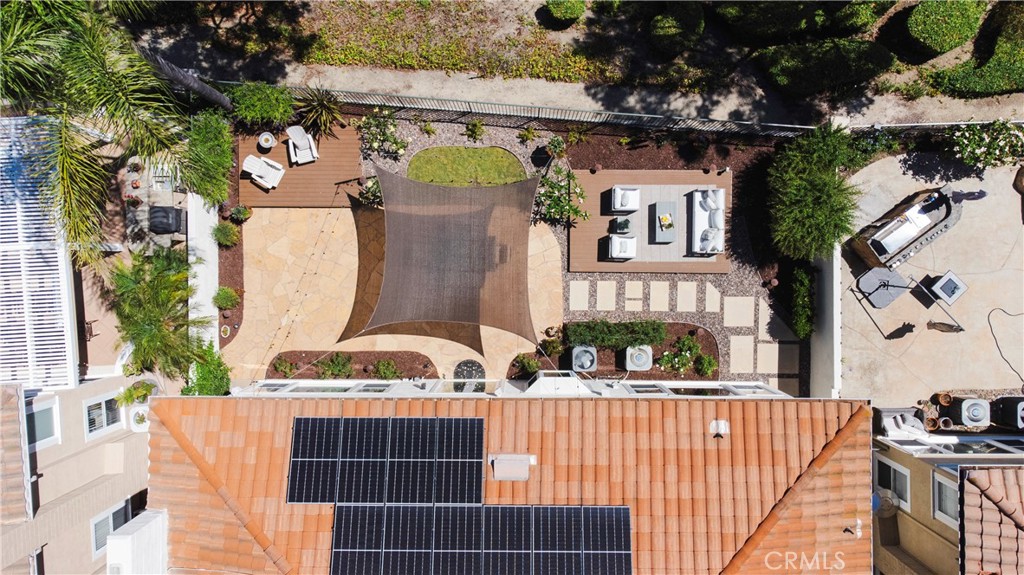 12 Serna Rancho Santa Margarita, CA 92688 - Photo 53 of 75 a front view of a house with a garden