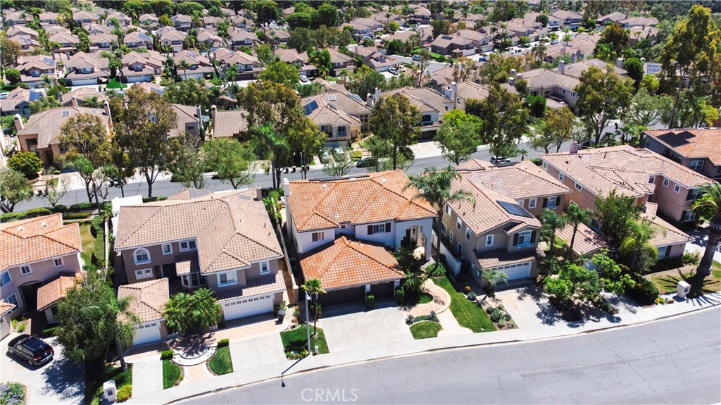 12 Serna Rancho Santa Margarita, CA 92688 - Photo 54 of 75 an aerial view of a house with garden space and street view