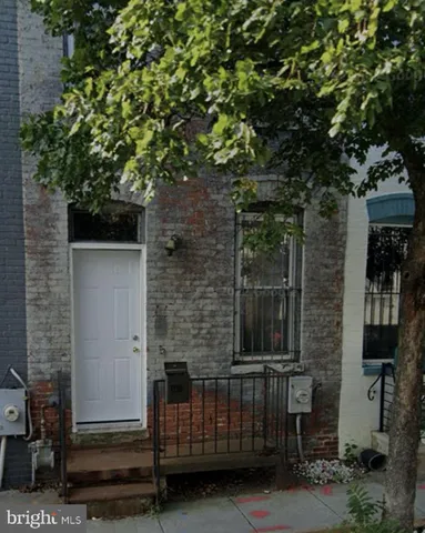 a view of a door with a tree
