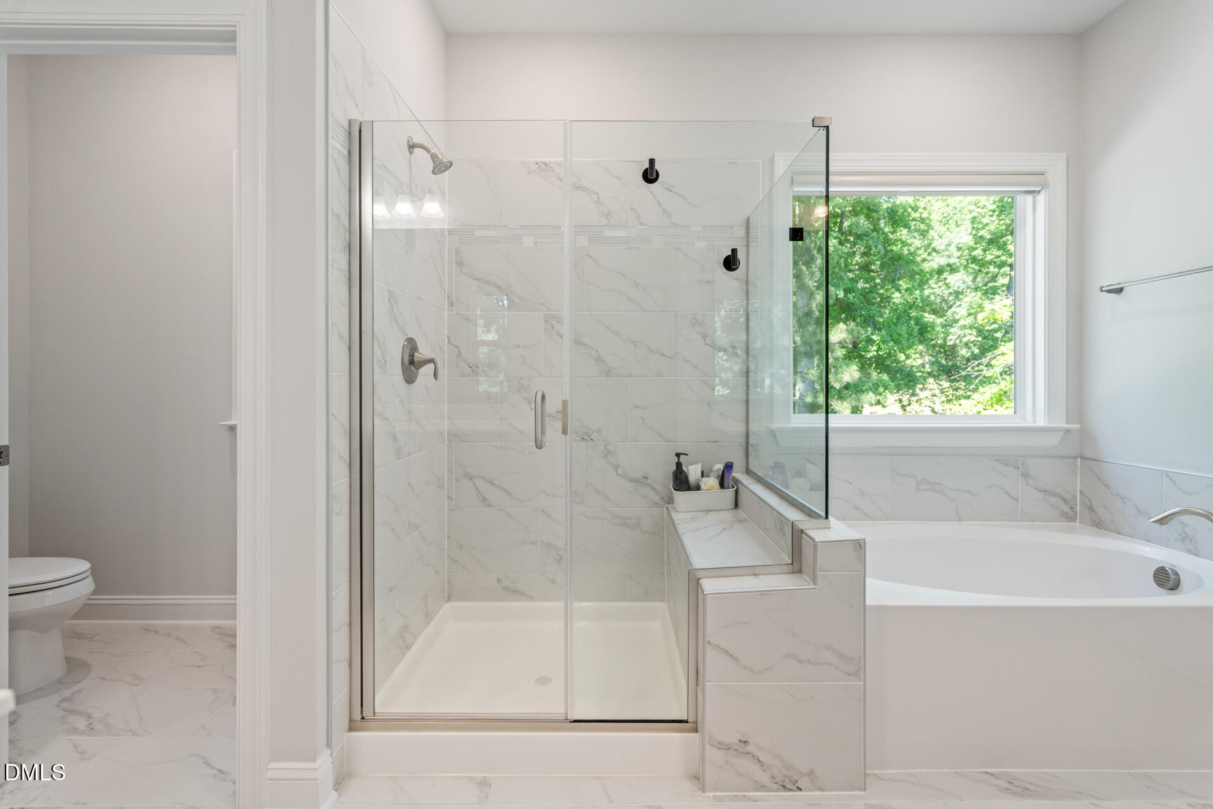 2966 Rise And Shine Road Apex, NC 27502 - Photo 33 of 61 a bathroom with a bathtub and a shower