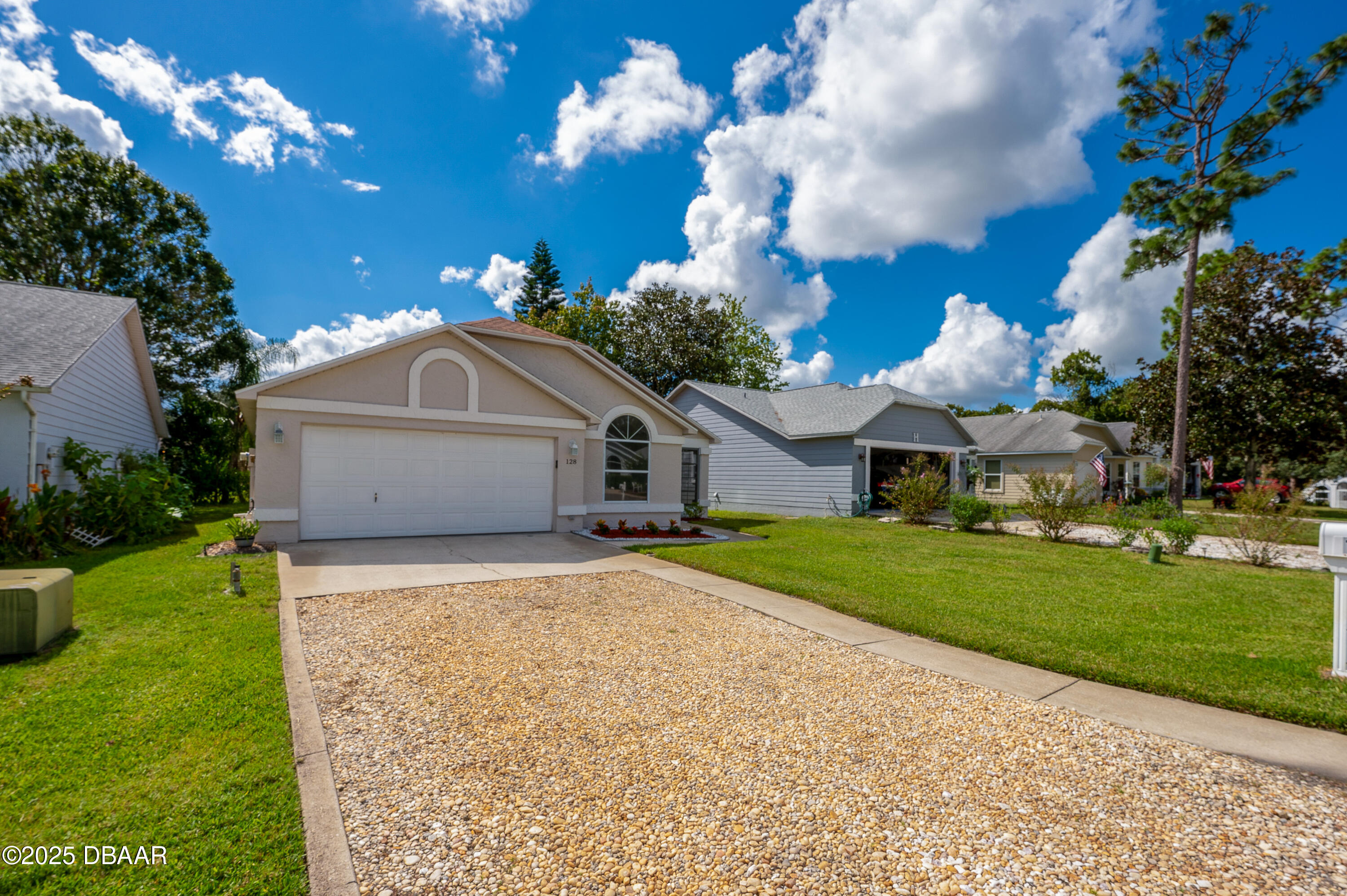 128 Crooked Pine Road Port Orange, FL 32128 - Photo 2 of 46 2-car garage and ample parking