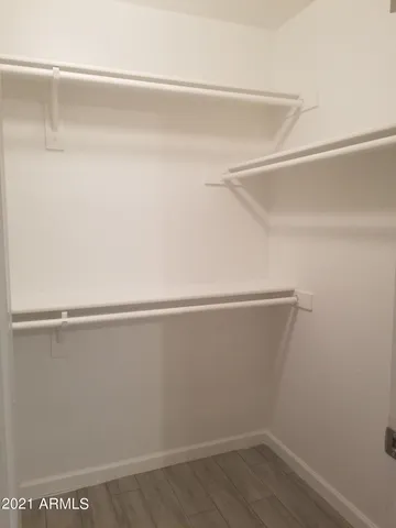 a view of a room with racks on the wall