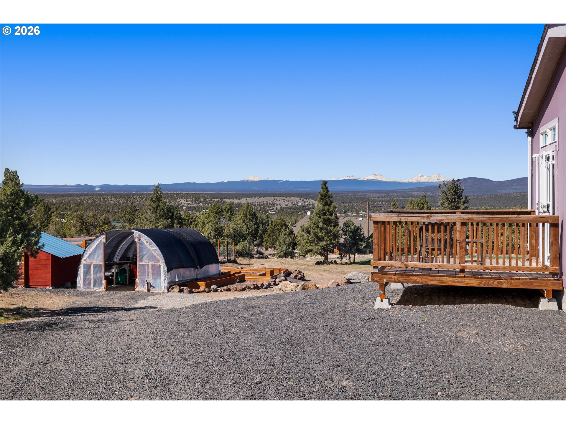 5172 Southeast Oswego Road Prineville, OR 97754 - Photo 36 of 48 a view of a terrace with wooden fence