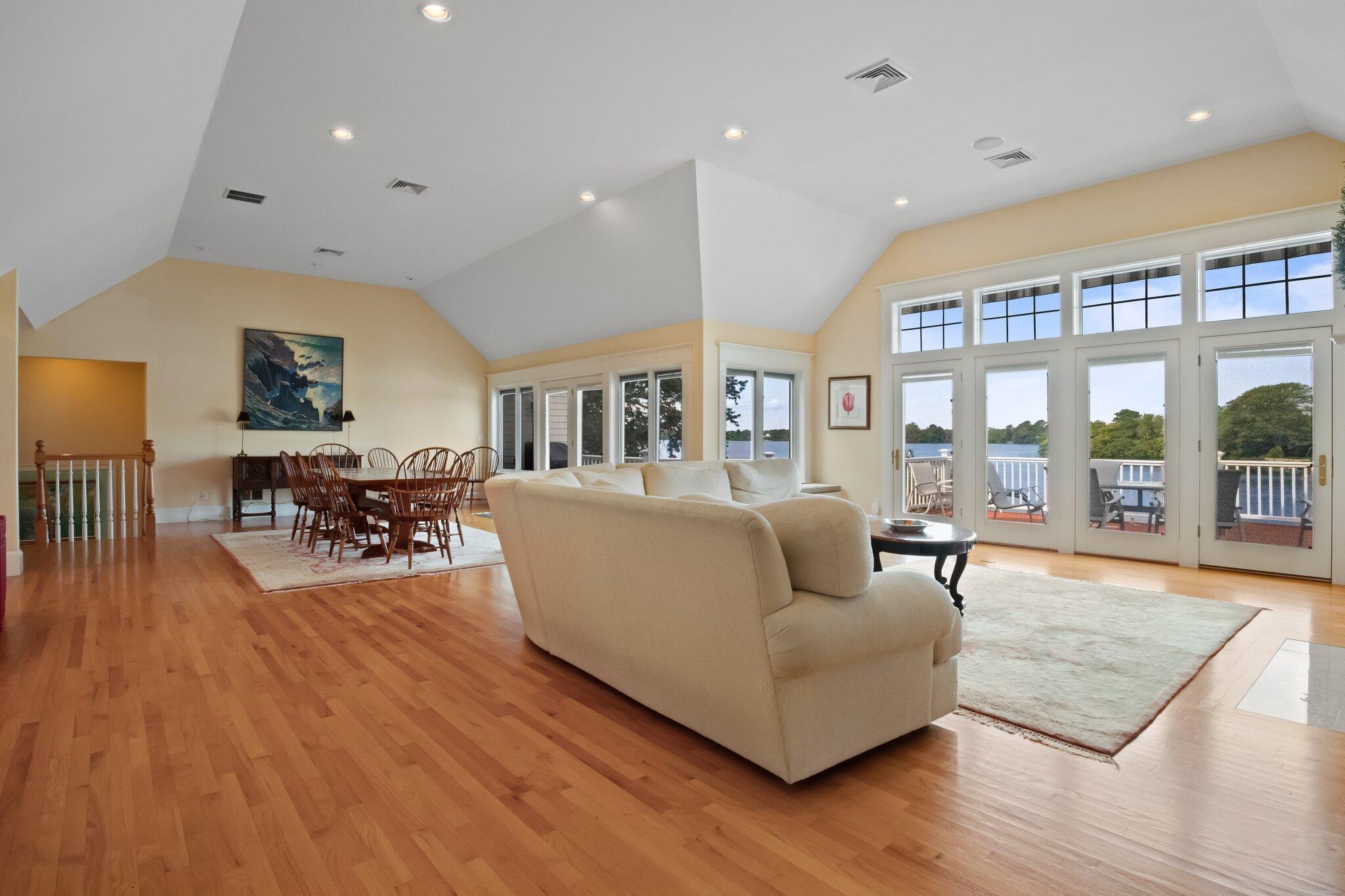 99 Center Lane Centerville, MA 02632 - Photo 11 of 89 a living room with furniture and a wooden floor