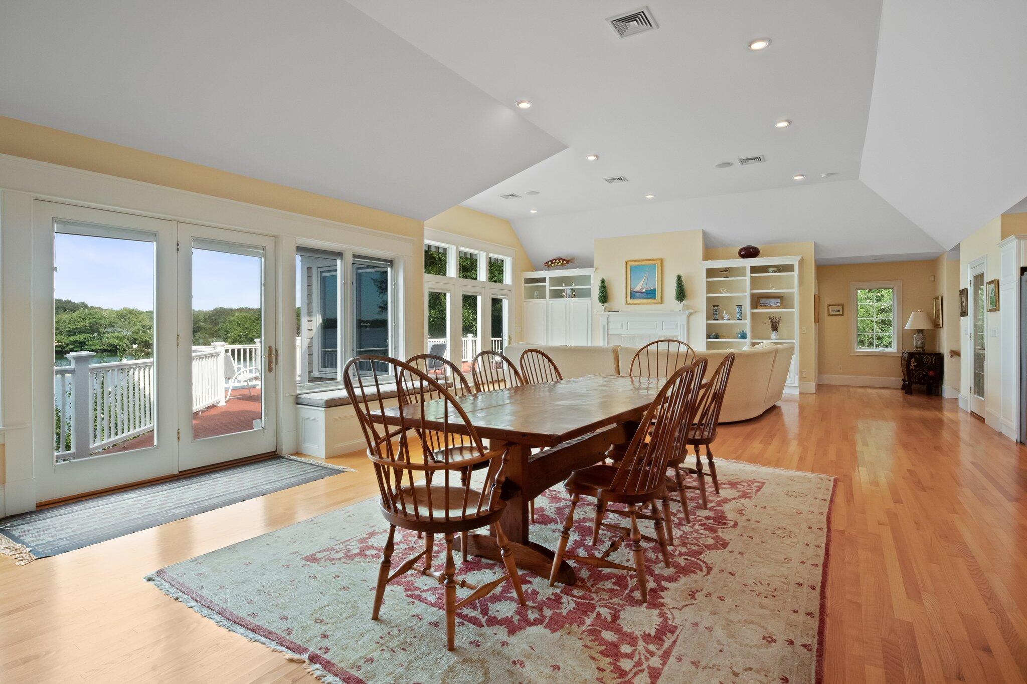 99 Center Lane Centerville, MA 02632 - Photo 16 of 89 a view of a dining room with furniture and wooden floor