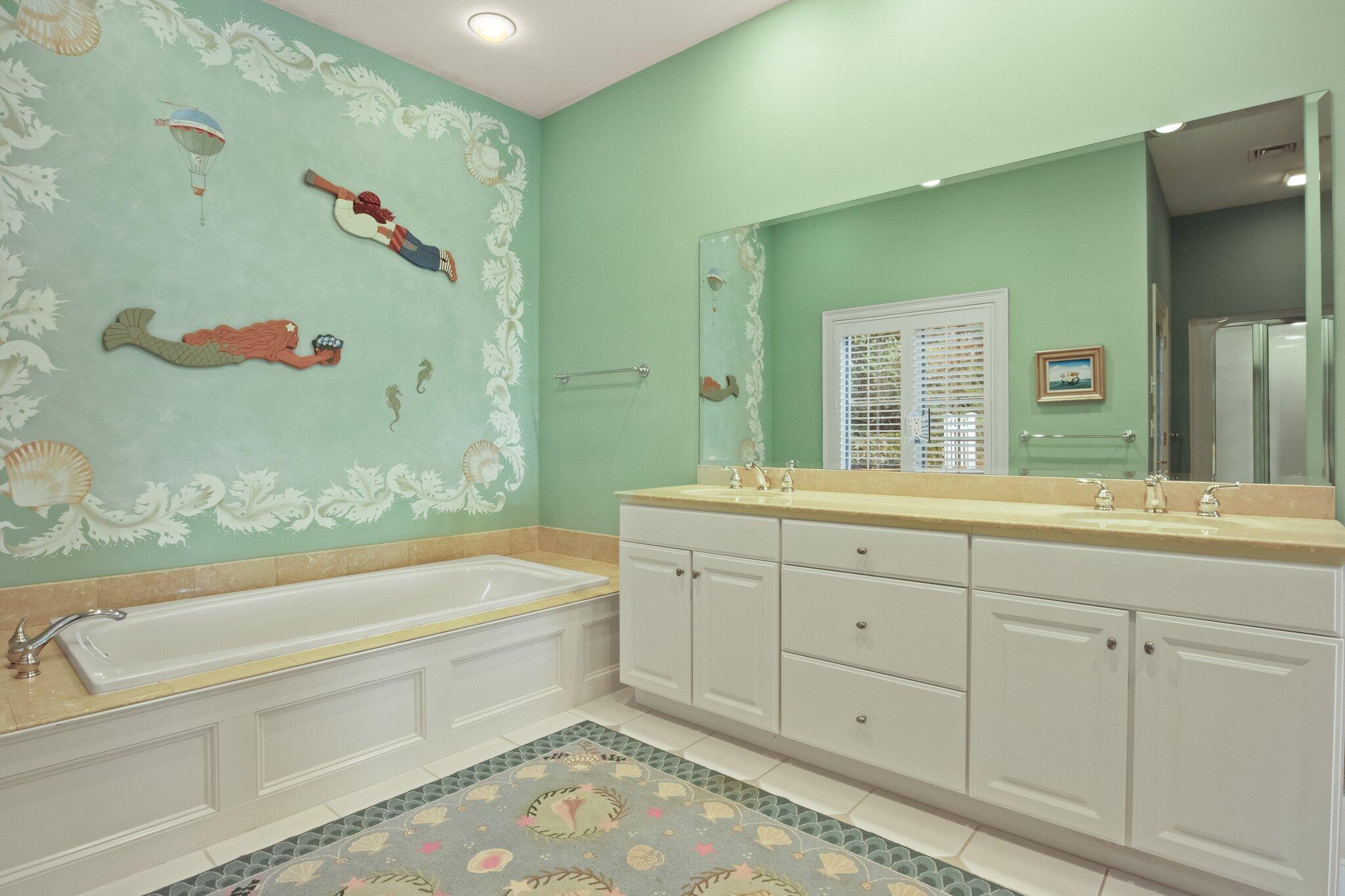 99 Center Lane Centerville, MA 02632 - Photo 35 of 89 a bathroom with a bathtub a sink and a shower