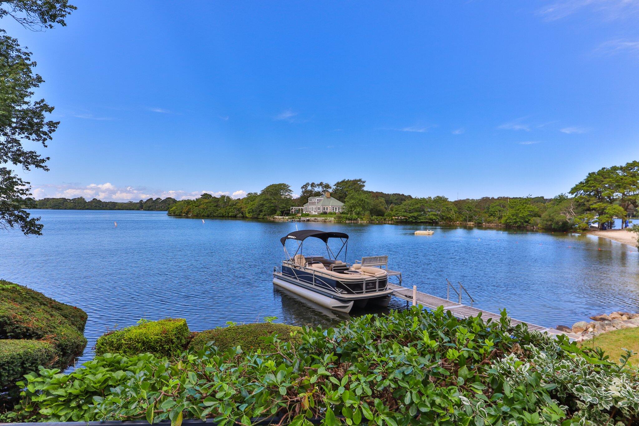 99 Center Lane Centerville, MA 02632 - Photo 41 of 89 a view of a lake with a mountain in the background