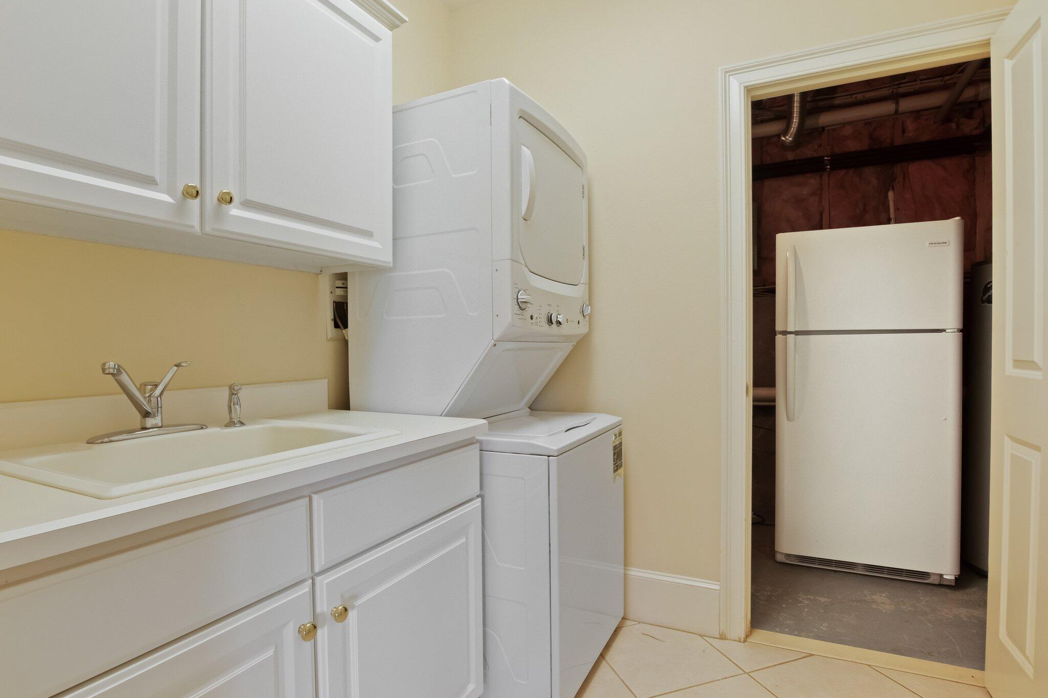 99 Center Lane Centerville, MA 02632 - Photo 42 of 89 a utility room with dryer and washer