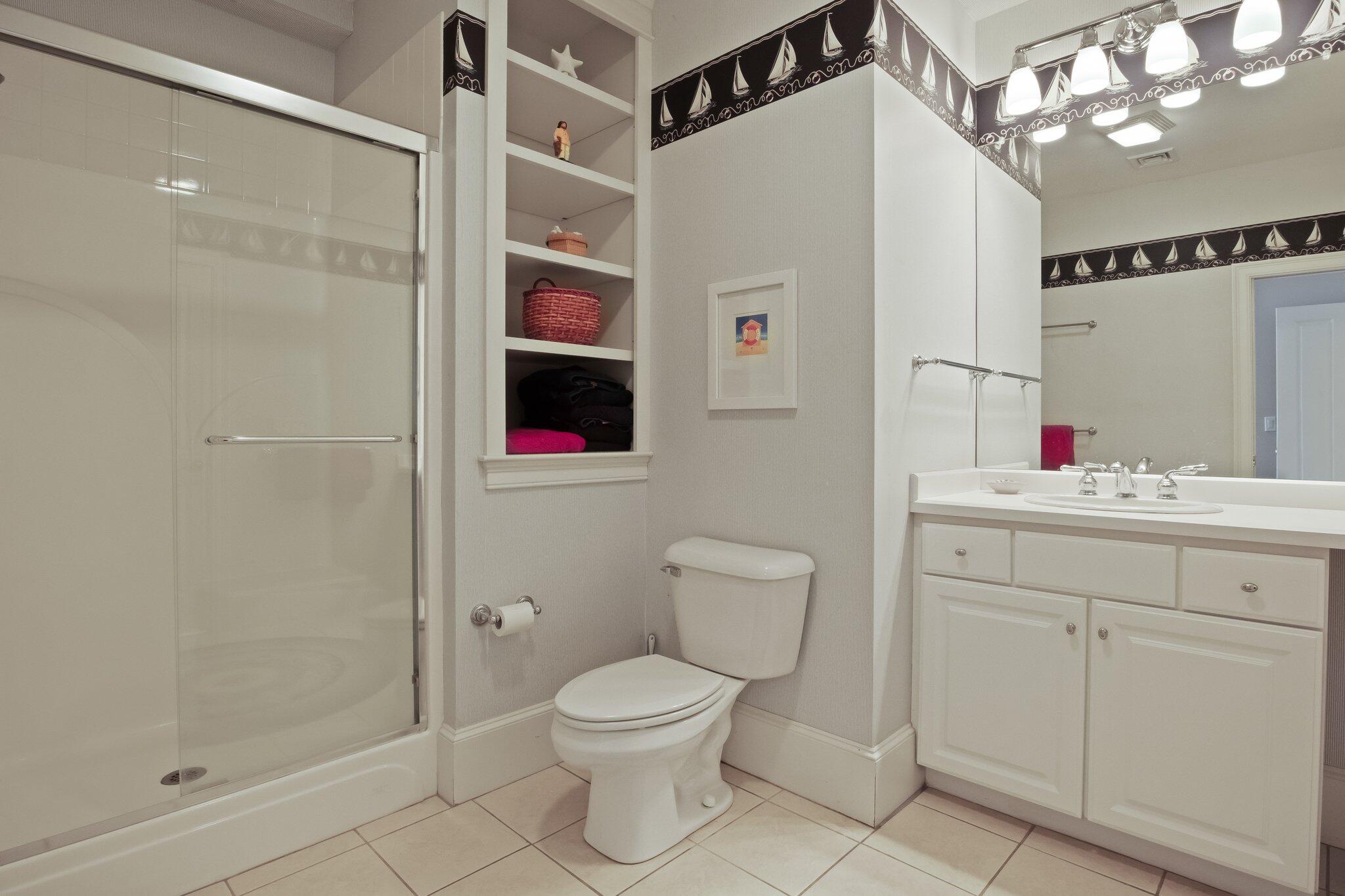 99 Center Lane Centerville, MA 02632 - Photo 52 of 89 a bathroom with a toilet sink and shower