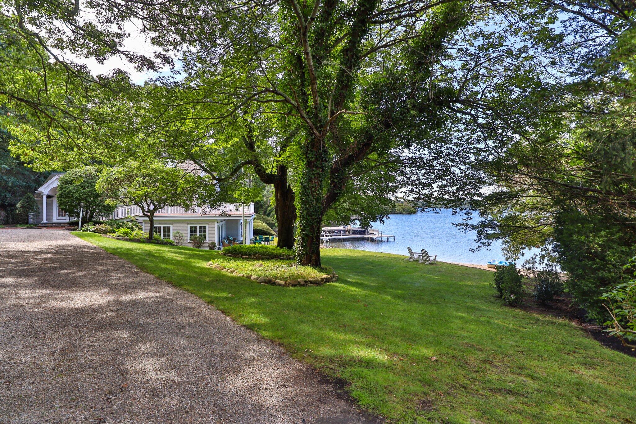 99 Center Lane Centerville, MA 02632 - Photo 61 of 89 a front view of a house with garden