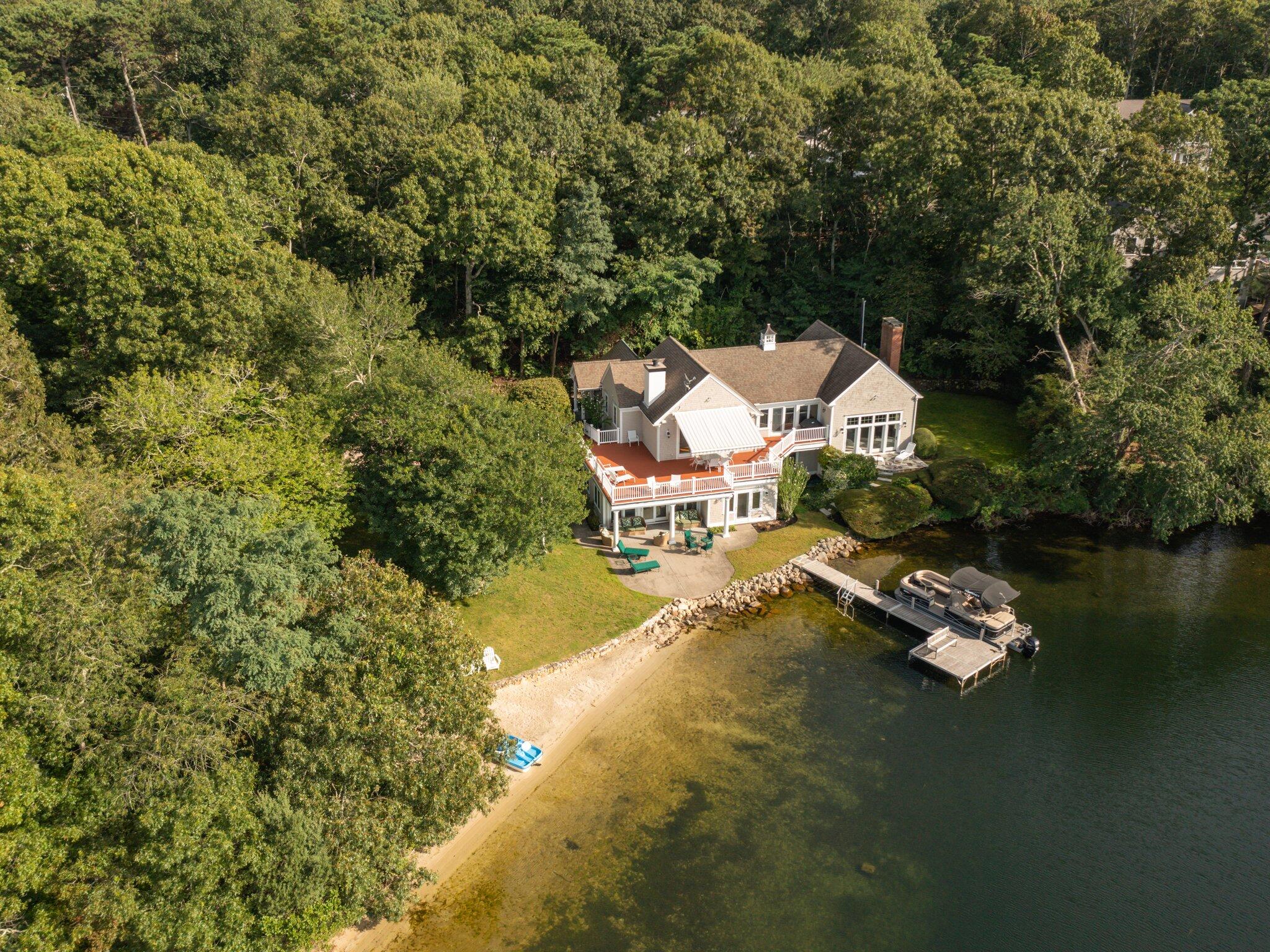 99 Center Lane Centerville, MA 02632 - Photo 75 of 89 an aerial view of a house with swimming pool and lake view