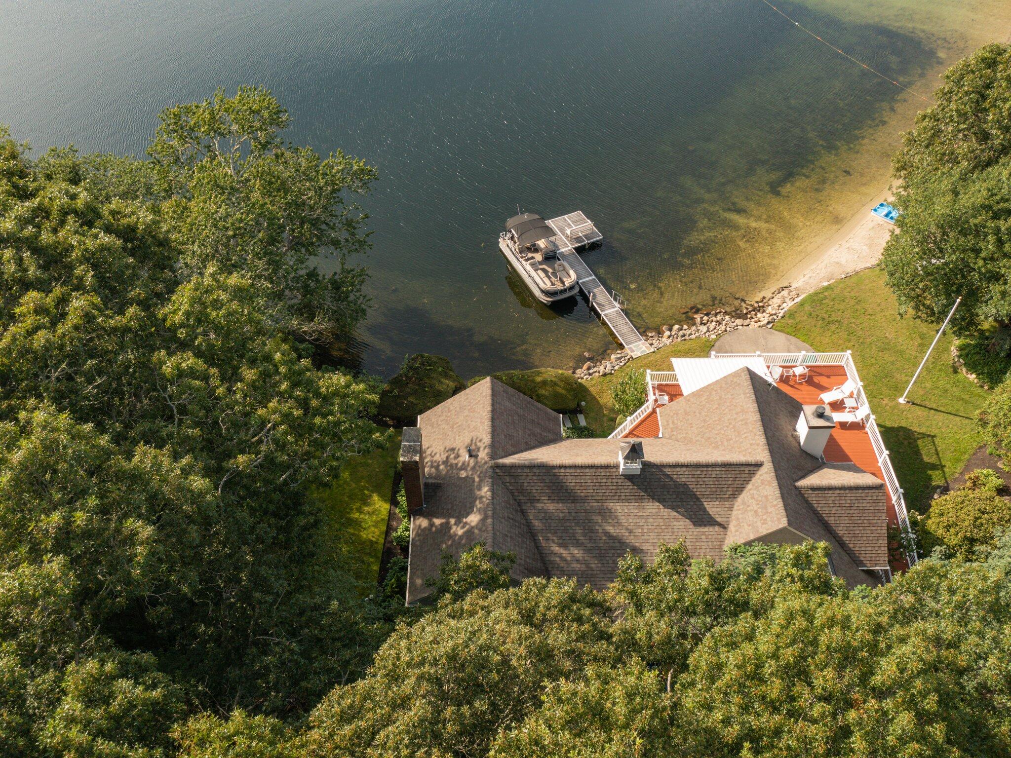 99 Center Lane Centerville, MA 02632 - Photo 79 of 89 an aerial view of a house with a yard basket ball court and outdoor seating