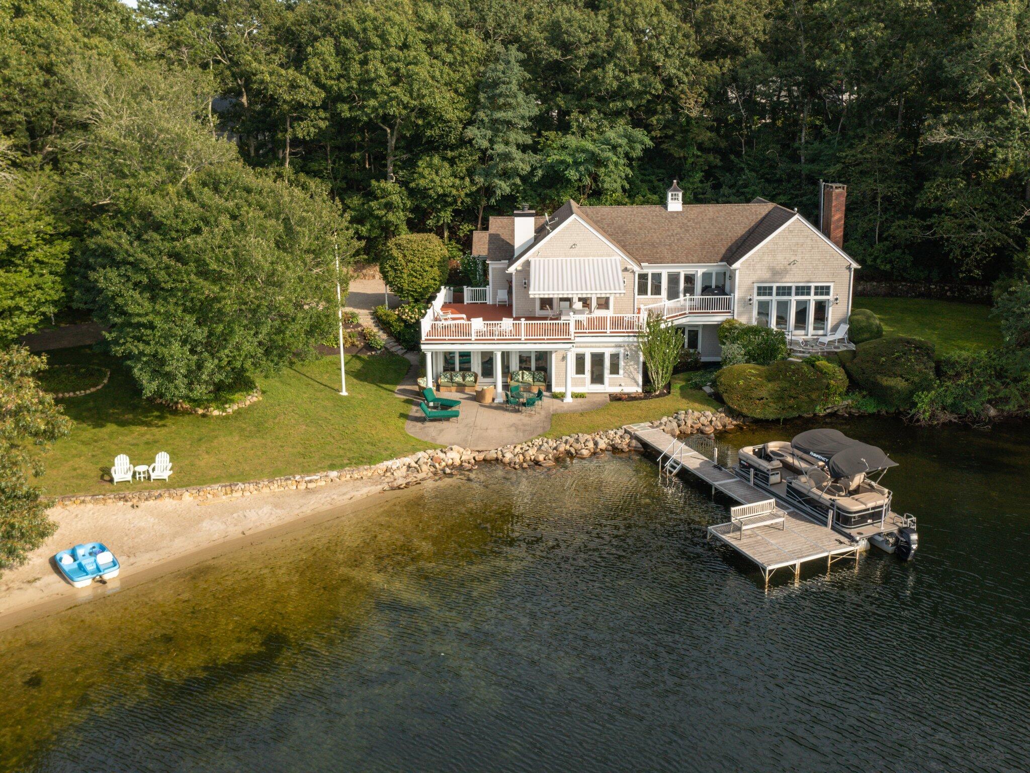 99 Center Lane Centerville, MA 02632 - Photo 82 of 89 a view of a house with a yard balcony and sitting area