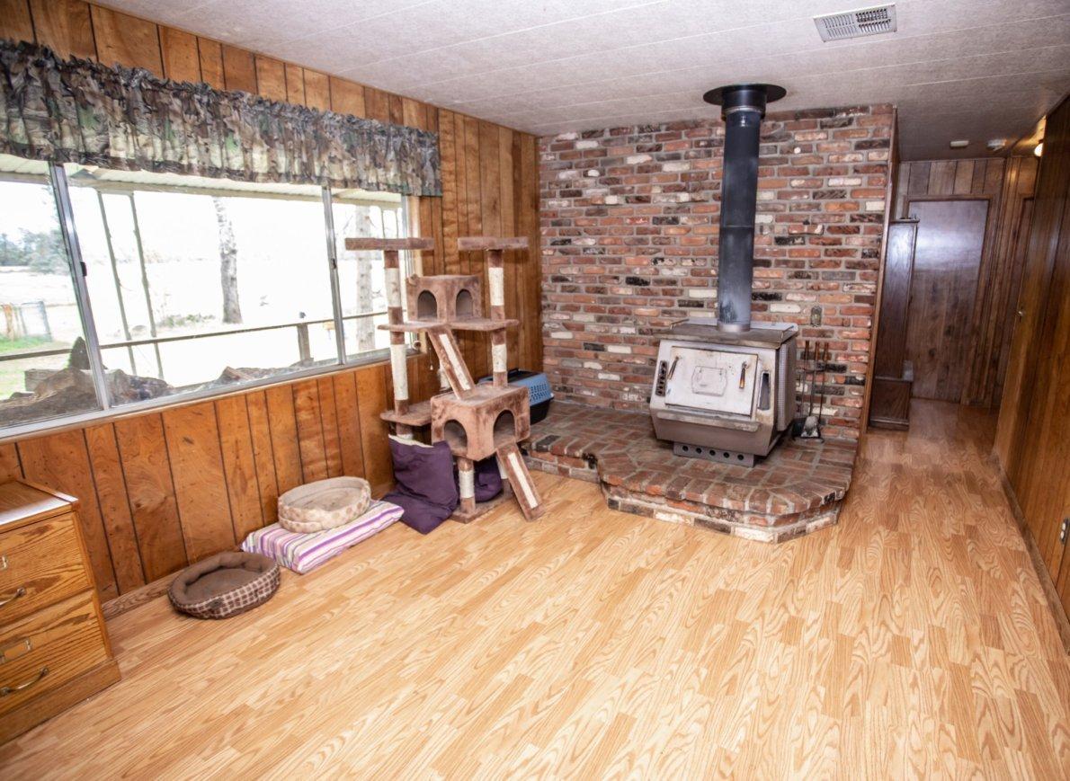 15707 Cloverdale Road Anderson, CA 96007 - Photo 7 of 18 Wood burning Fire place