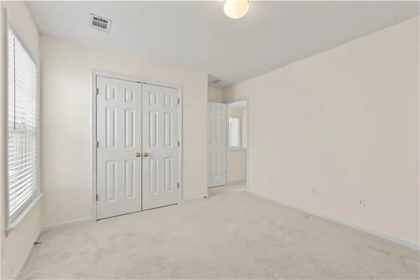 an empty room with windows