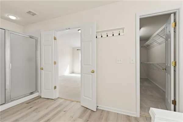 a view of a hallway with stairs