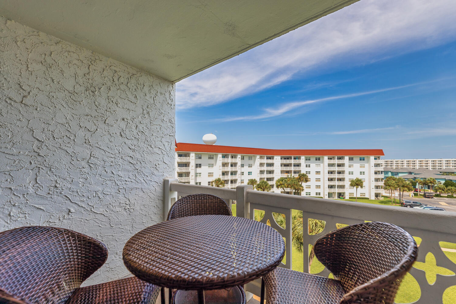 909 Santa Rosa Boulevard, Unit 256 Fort Walton Beach, FL 32548 - Photo 15 of 33 a view of a balcony with table and chairs