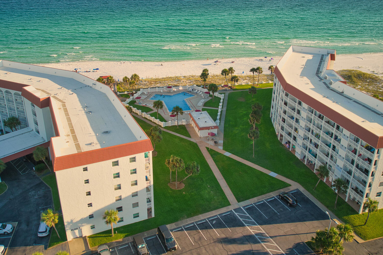 909 Santa Rosa Boulevard, Unit 256 Fort Walton Beach, FL 32548 - Photo 16 of 33 a view of a swimming pool with a garden