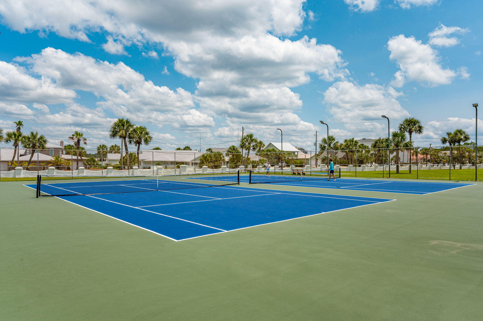 909 Santa Rosa Boulevard, Unit 256 Fort Walton Beach, FL 32548 - Photo 26 of 33 a view of an outdoor space and tennis court