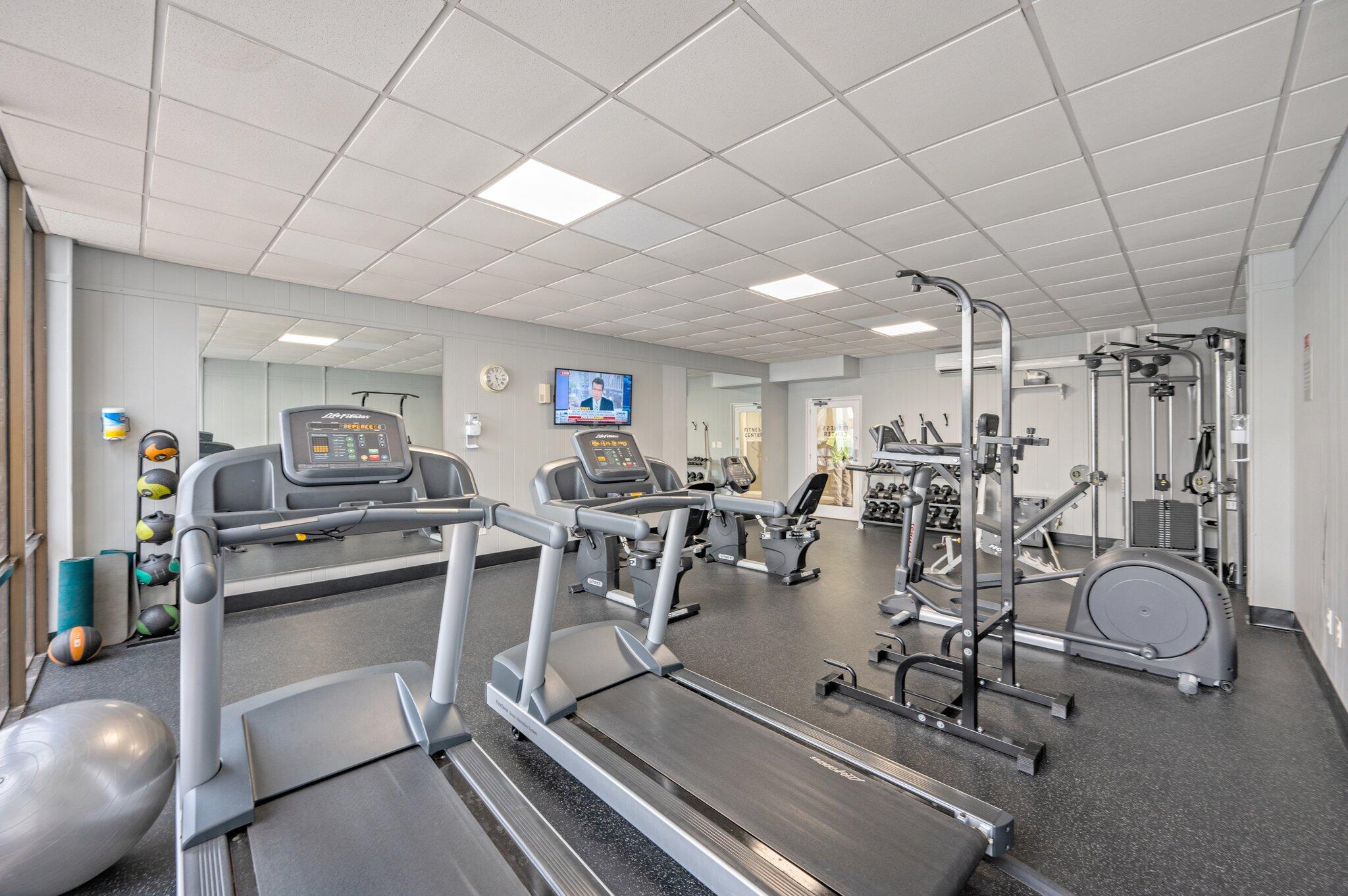 909 Santa Rosa Boulevard, Unit 256 Fort Walton Beach, FL 32548 - Photo 31 of 33 a view of a room with gym equipment