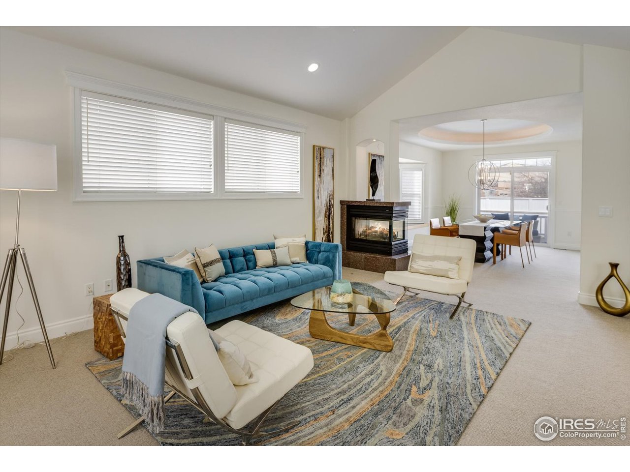 1241 High Street Boulder, CO 80304 - Photo 2 of 36 a living room with furniture and a fireplace