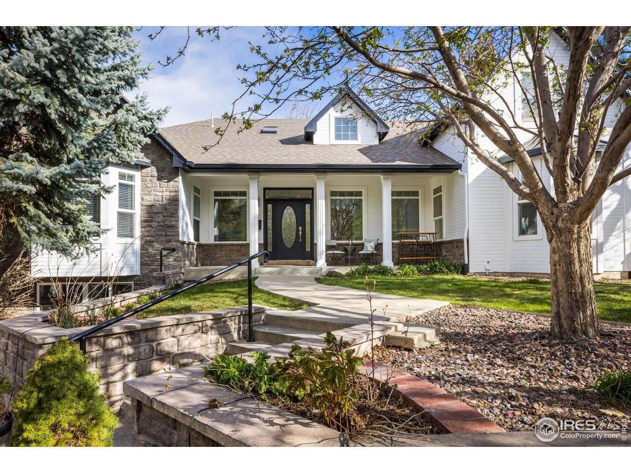 1241 High Street Boulder, CO 80304 - Photo 26 of 36 a view of a house with backyard and trees