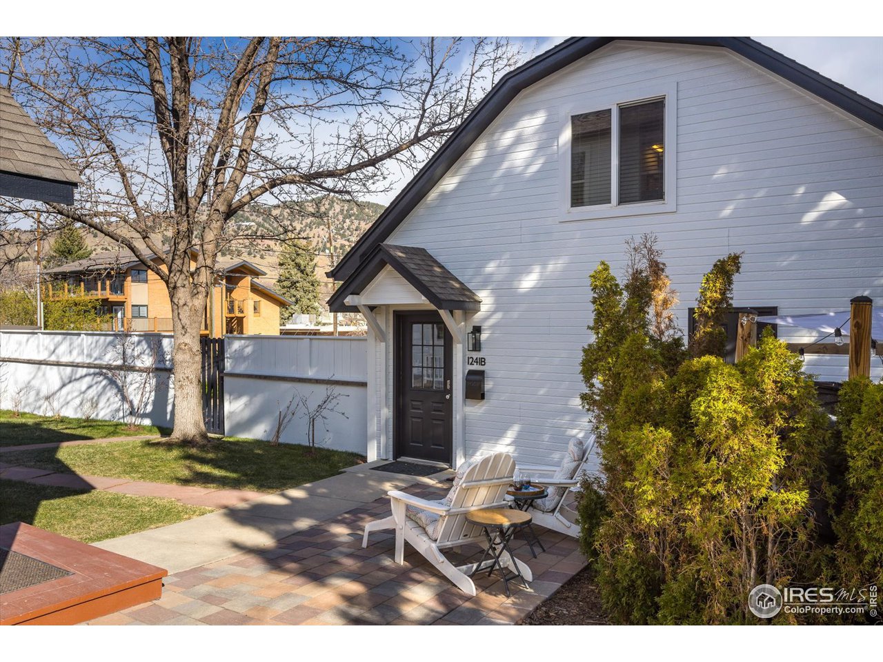 1241 High Street Boulder, CO 80304 - Photo 30 of 36 a view of a house with a yard