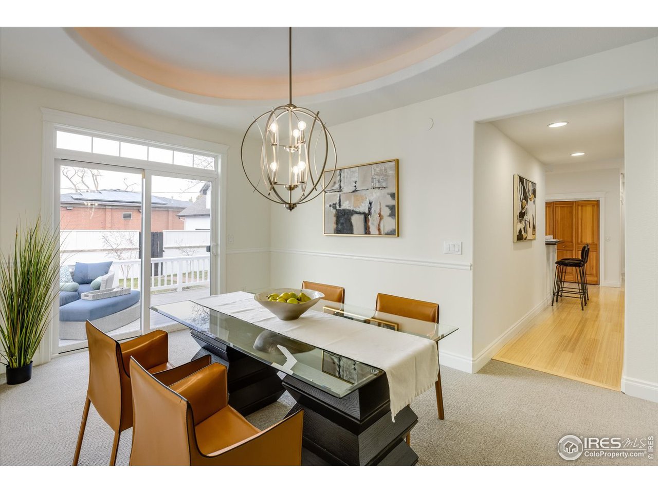 1241 High Street Boulder, CO 80304 - Photo 4 of 36 a view of a dining room with furniture and wooden floor