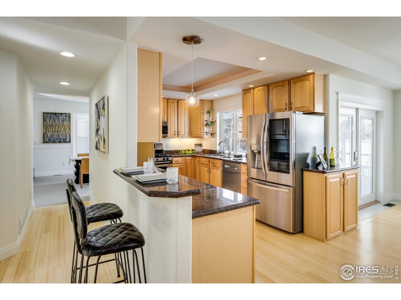 1241 High Street Boulder, CO 80304 - Photo 5 of 36 a kitchen with granite countertop kitchen island stainless steel appliances a sink and counter