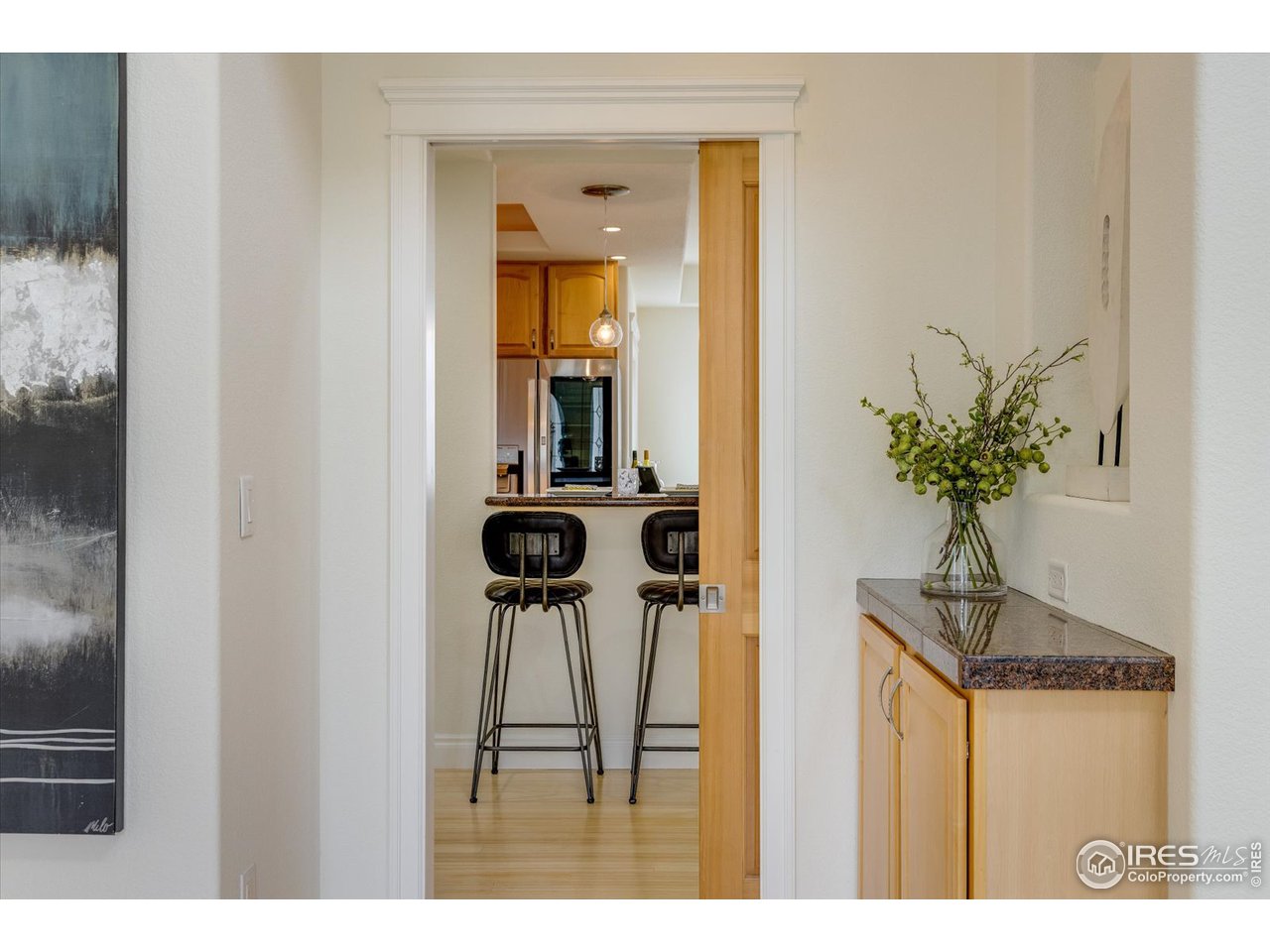 1241 High Street Boulder, CO 80304 - Photo 8 of 36 a view of a room with a mirror and furniture