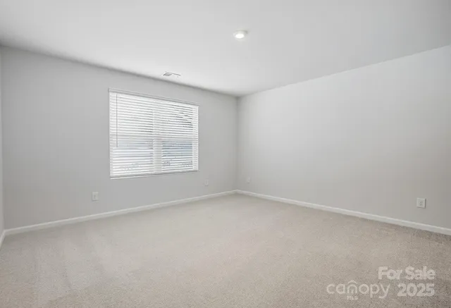 an empty room with an entryway