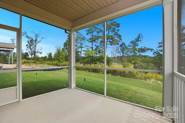 a view of a glass door of the house