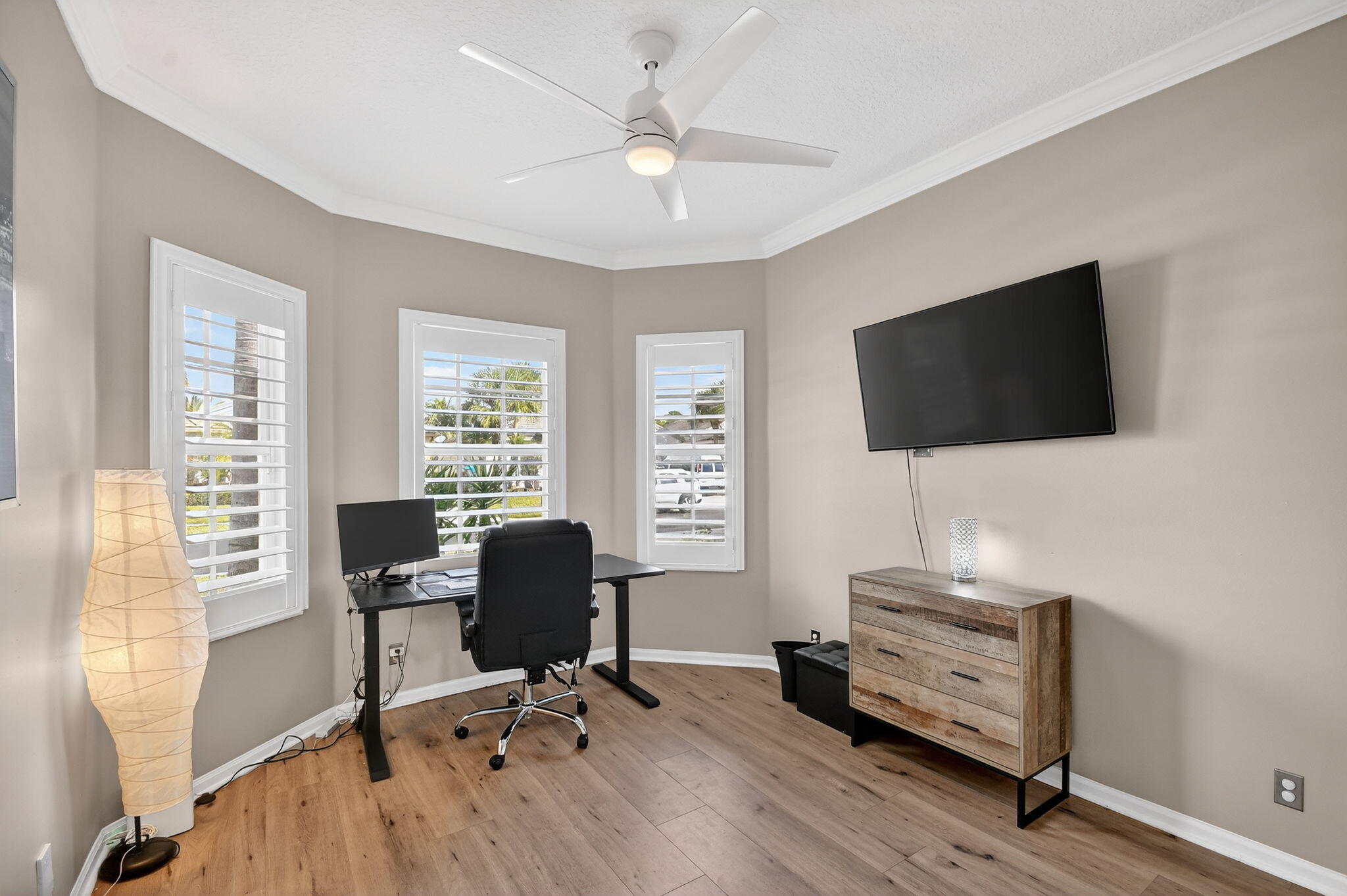 10202 Clubhouse Turn Road Lake Worth, FL 33449 - Photo 9 of 21 a view of a livingroom with workspace and a window