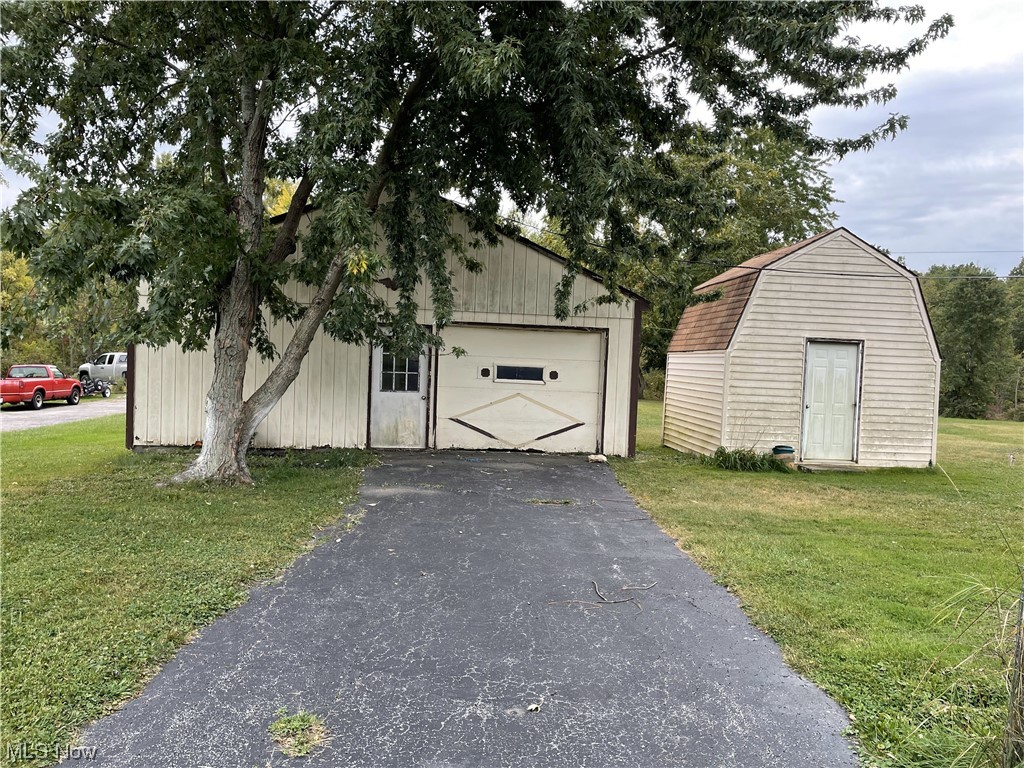 4107 Jaeger Road Lorain, OH 44053 - Photo 2 of 33 View of garage and shed
