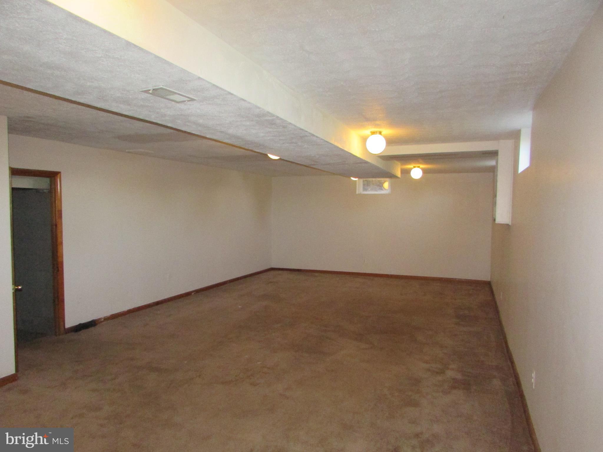 2749 Ebbvale Road Manchester, MD 21102 - Photo 21 of 30 Partially Finished Recreation Room in Basement