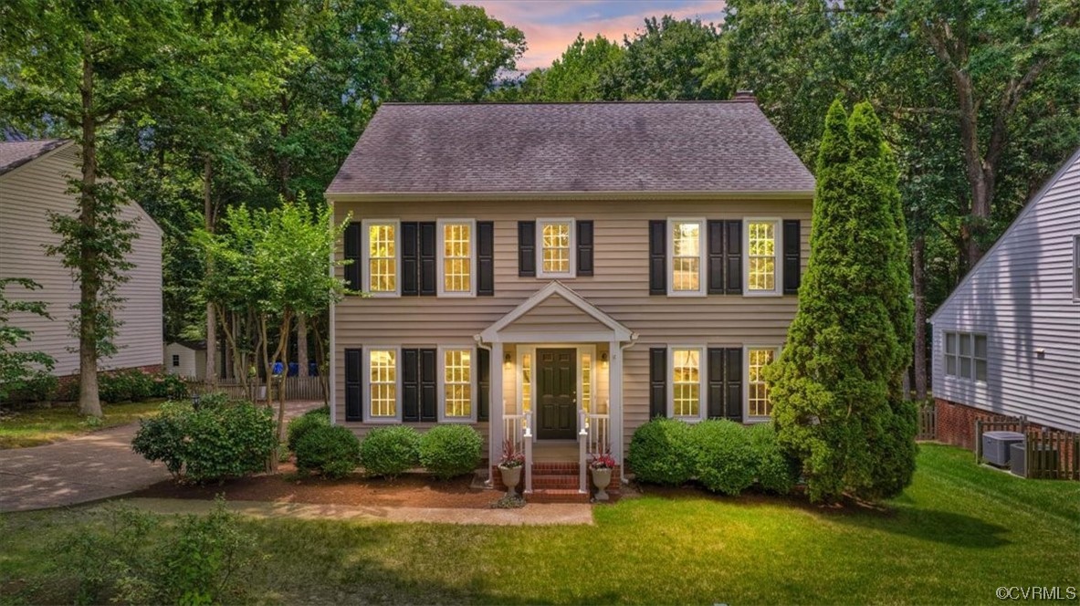Colonial house with front yard