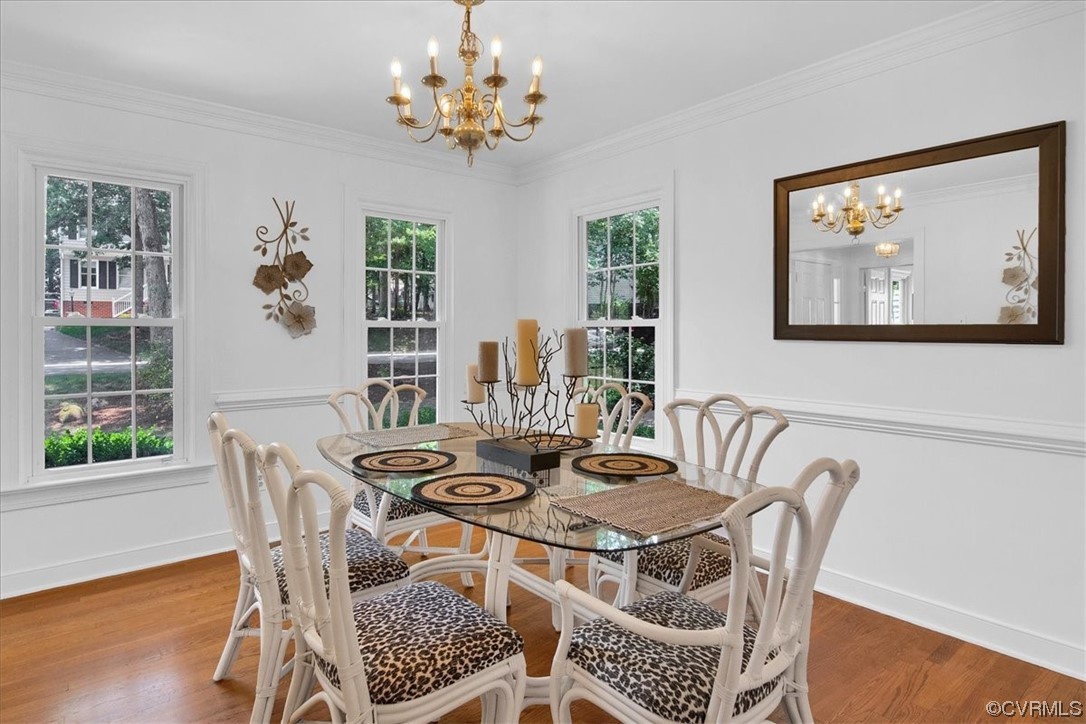 12516 Eagle Ridge Road Henrico, VA 23233 - Photo 12 of 48 Dining room with plenty of natural light, wood-type flooring, and a chandelier